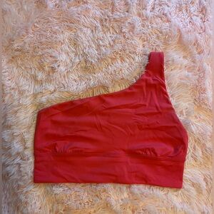 Hot pink Lululemon one shouldered bra/tank top